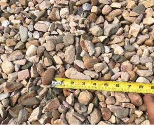 Rounded brown river rock.