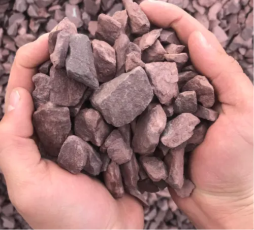Washed purple-red landscaping stone.
