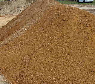 Screened red sandy-clay fill dirt.